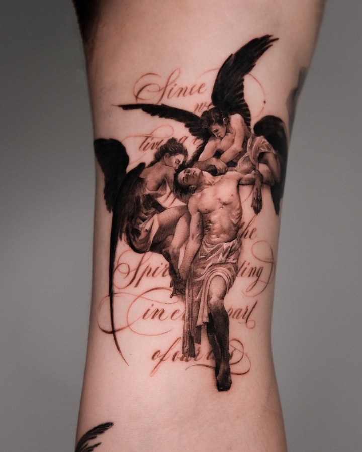 An angel with lettering tattooed on the ribs