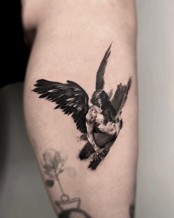 An angel tattooed on the calf
