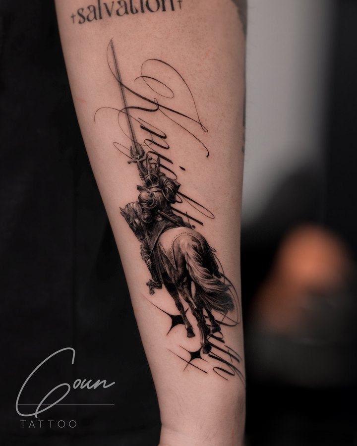 A mounted knight with lettering, tattooed on the arm